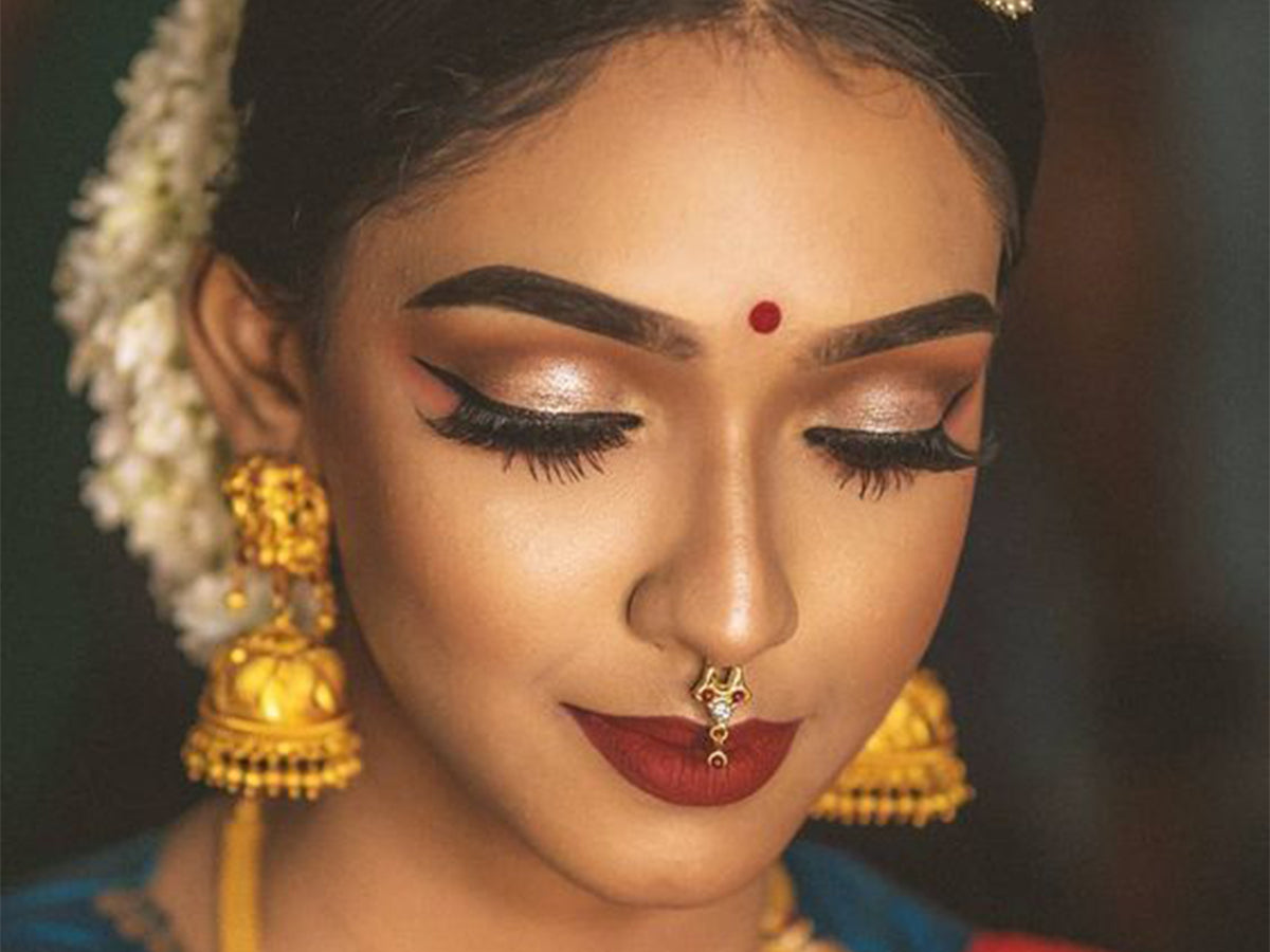 makeup for orange indian dress Engagement couple outfit pose bride groom orange lehenga hairstyle makeup  luxurylook